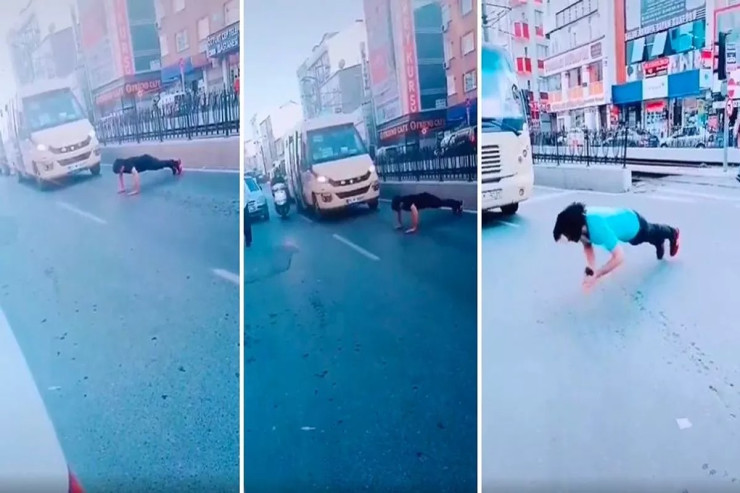 Yolun ortasında idman edib hərəkəti dayandırdı - VİDEO 