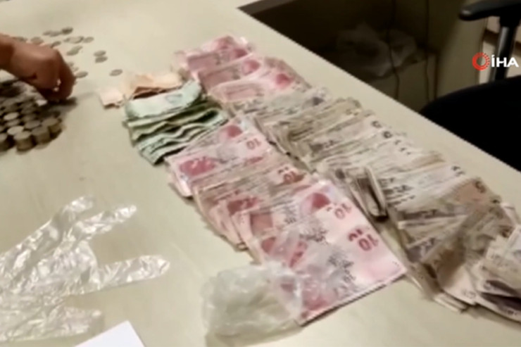 Dilənçinin üstündən o qədər pul çıxdı ki, polis çaş-baş qaldı - VİDEO 